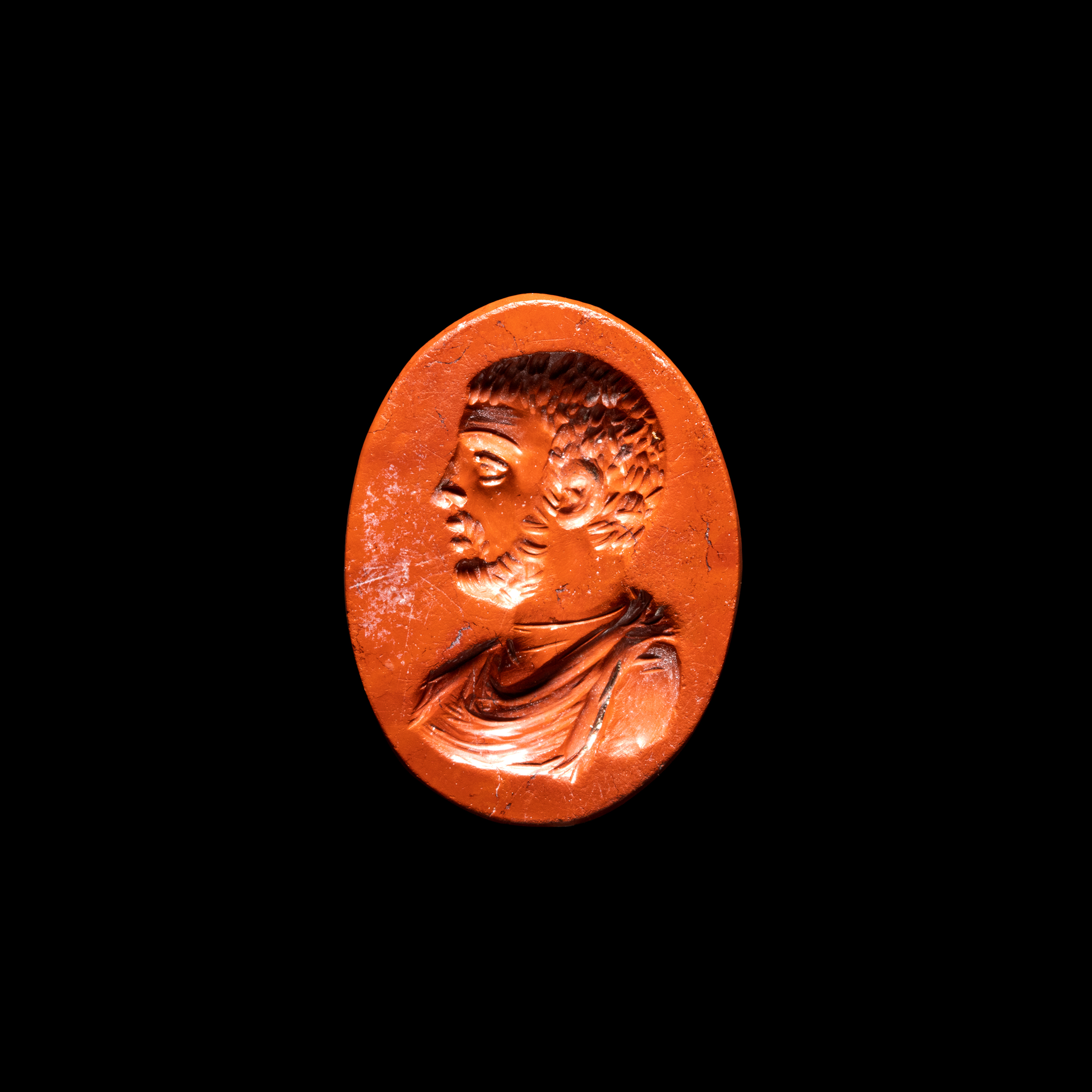 *A Roman red jasper intaglio from the Sangiorgi collection. Bust of a man.